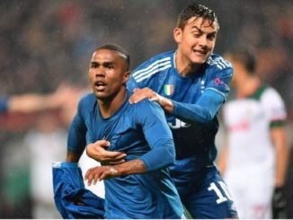 Juventus' Douglas Costa celebrates with Paulo Dybala after scoring. PHOTO: AFP