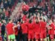 Union Berlin players celebrate after their win over leaders Monchengladbach