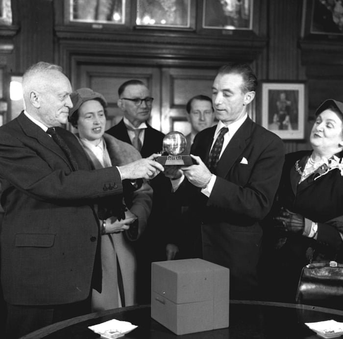 Gabriel Hanot holding the Ballon D'Or